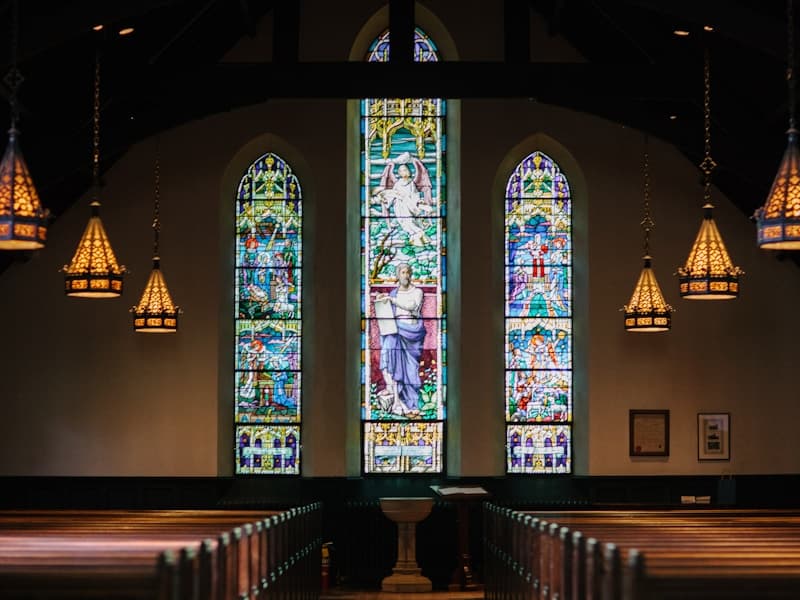 Church interior with stained glass windows